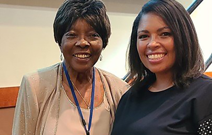 Safer Director, Erica Lee, accepting the Rock Island County NAACP’s Image award from Bonnie Ballard, NAACP branch president